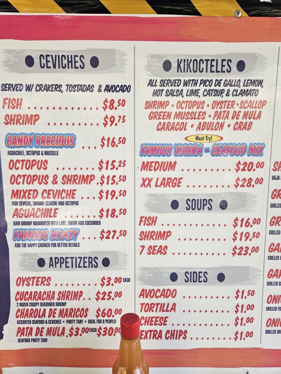 Restaurant menu highlighting ceviches and seafood tacos.